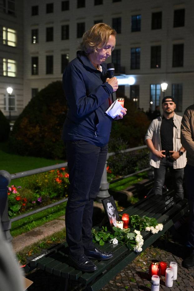 People gather to commemorate of Charlie Kirk in front of the Embassy of the United States in Berlin