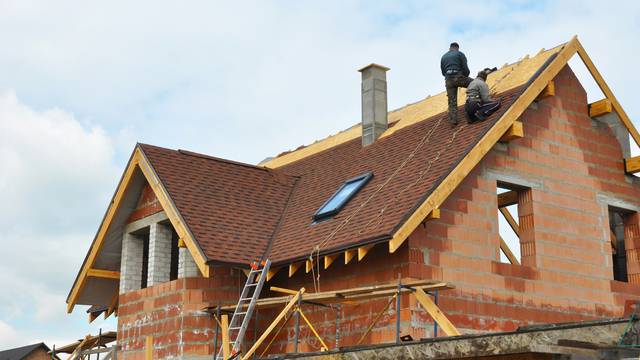 Roofing,Construction,And,Building,New,Brick,House,With,Modular,Chimney,