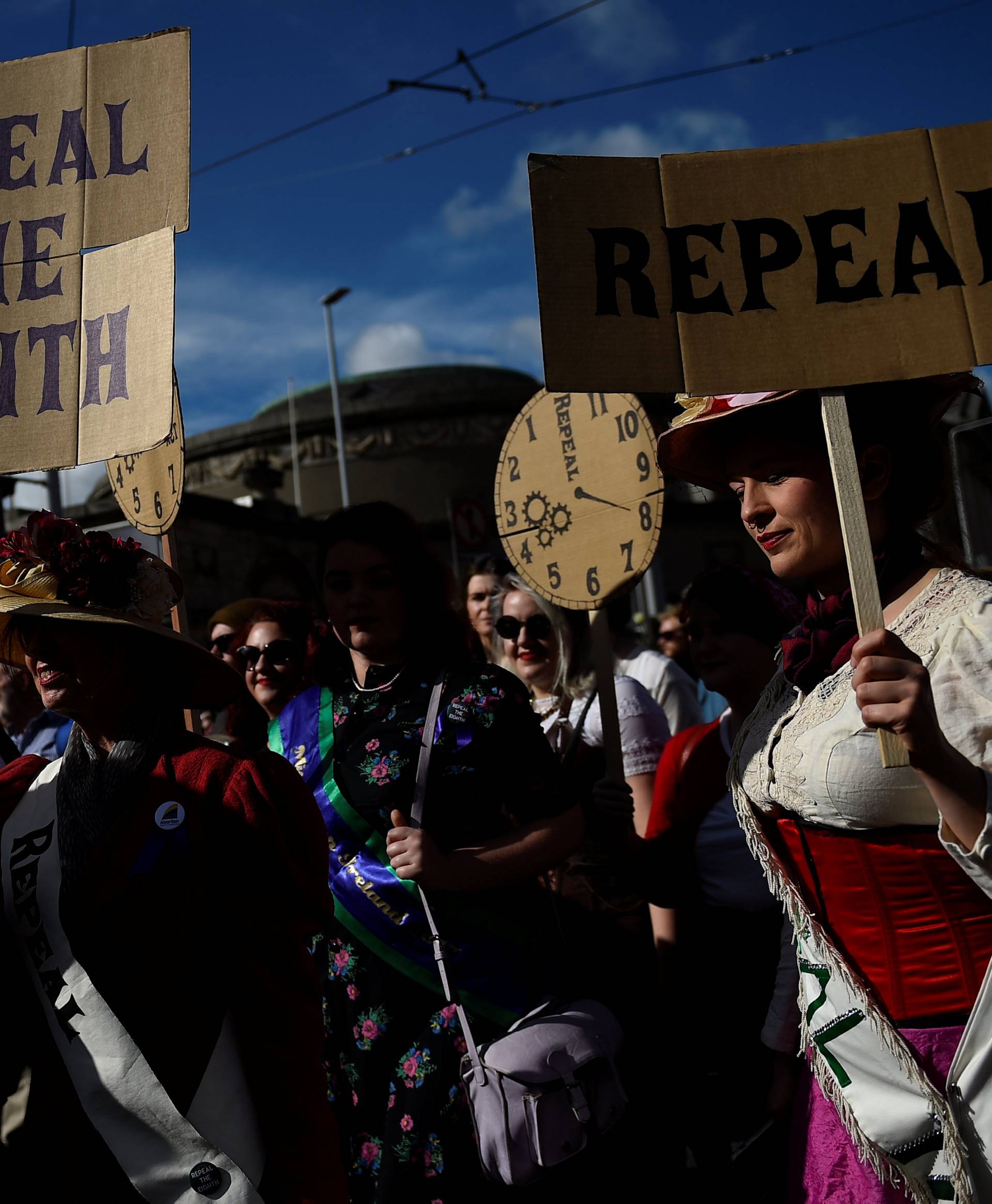 Demonstrators march for more liberal Irish abortion laws, in Dublin