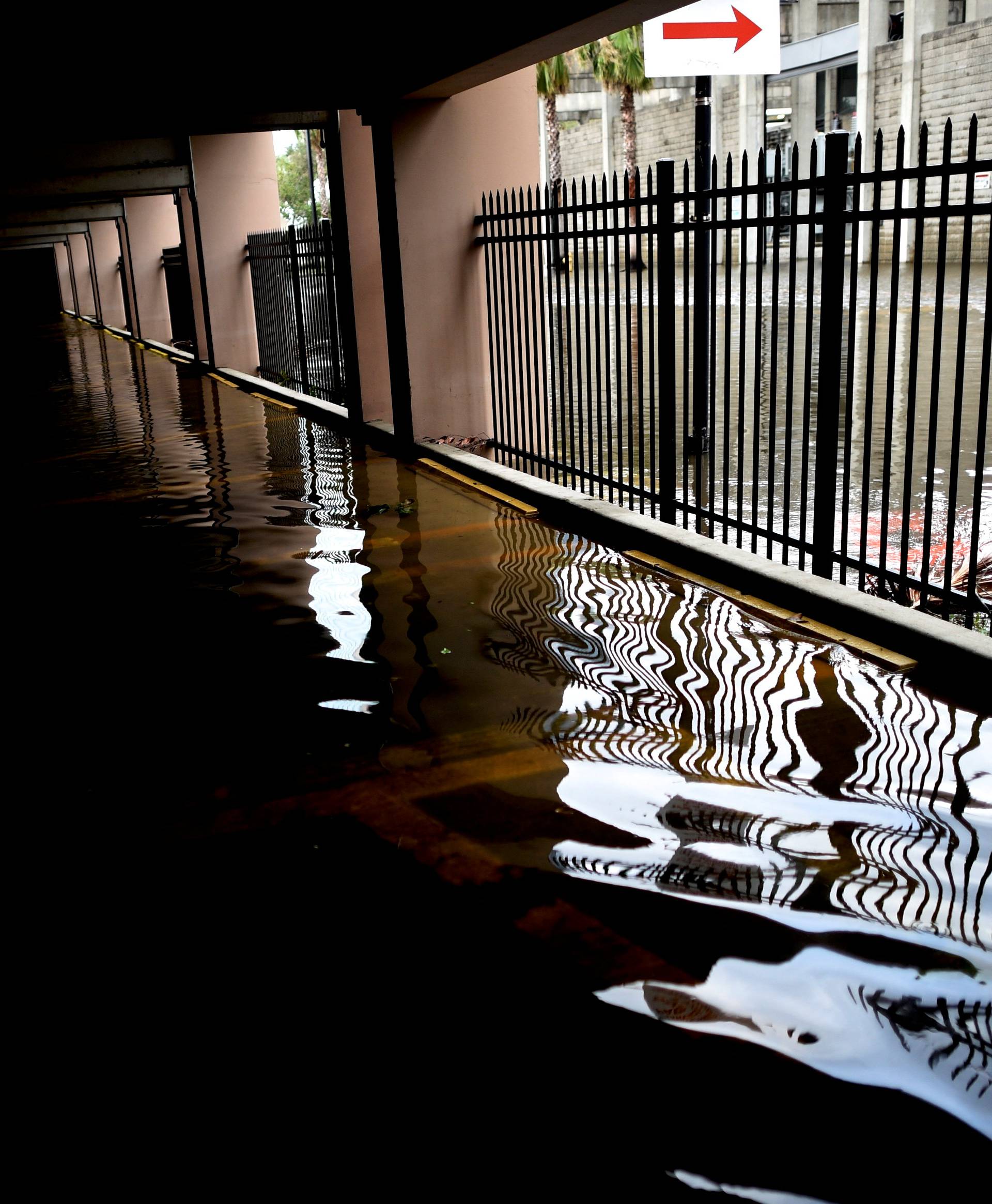 Flood waters engulf a parking garage after Hurricane Irma