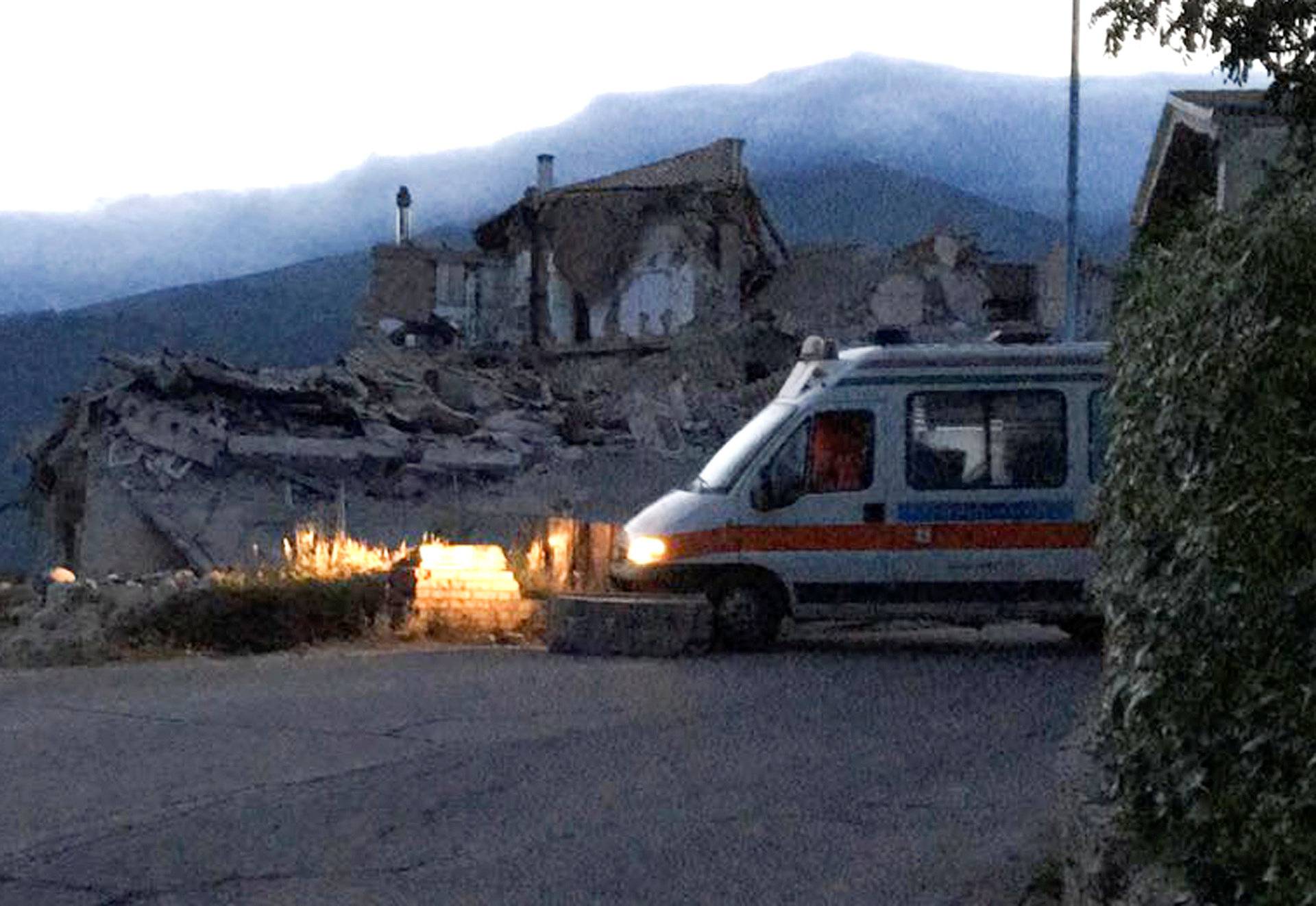 A destroyed house is seen following a quake in Amatrice