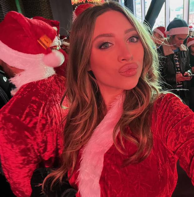 Model Ava Louise caught 'performing sex act' on Father Christmas in public during SantaCon