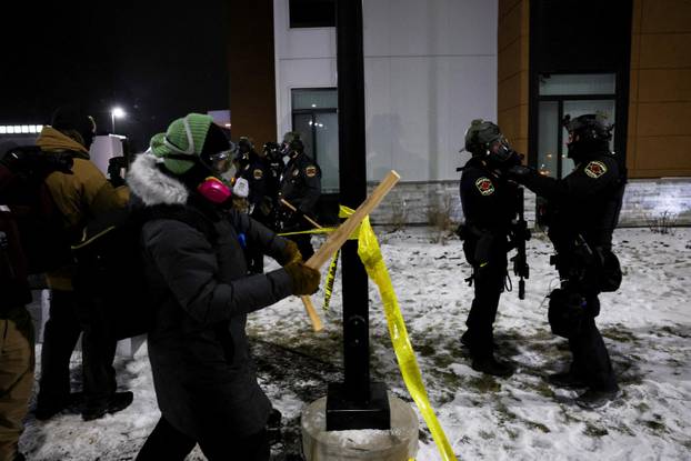 Protest outside the hotel where Bovino, who has been removed from his role, is reportedly staying, in Maple Grove