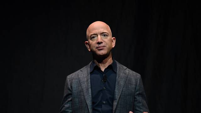 FILE PHOTO: Founder, Chairman, CEO and President of Amazon Jeff Bezos speaks during an event about Blue Origin's space exploration plans in Washington