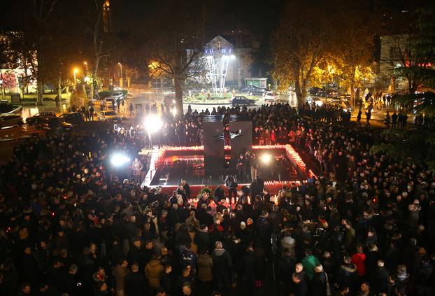 Bosnian Croats pray and light candles for the convicted general Slobodan Praljak, who killed himself seconds after the verdict in the U.N. war crimes tribunal in The Hague, in Mostar