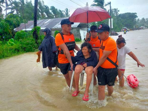 Rescue operation following flood due to Tropical Storm Nalgae in Philippines