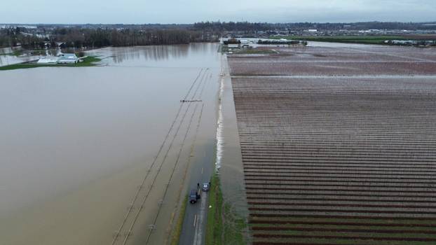 Floodwaters trigger evacuations and highway closures in British Columbia’s Fraser Valley