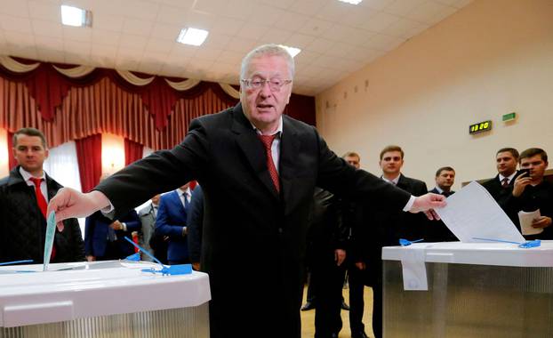 FILE PHOTO: Head of the Liberal Democratic Party of Russia Zhirinovsky casts ballots during parliamentary election in Moscow