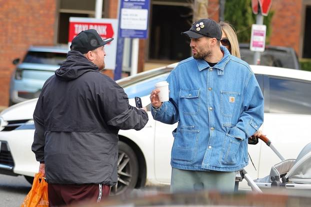 *EXCLUSIVE* WEB MUST CALL FOR PRICING - Manchester City's hard man, the Croatian footballer Mateo Kovacic with his wife Izabel and his father Stipo are stopped in their tracks by a somewhat irate fan in Wilmslow, Cheshire.