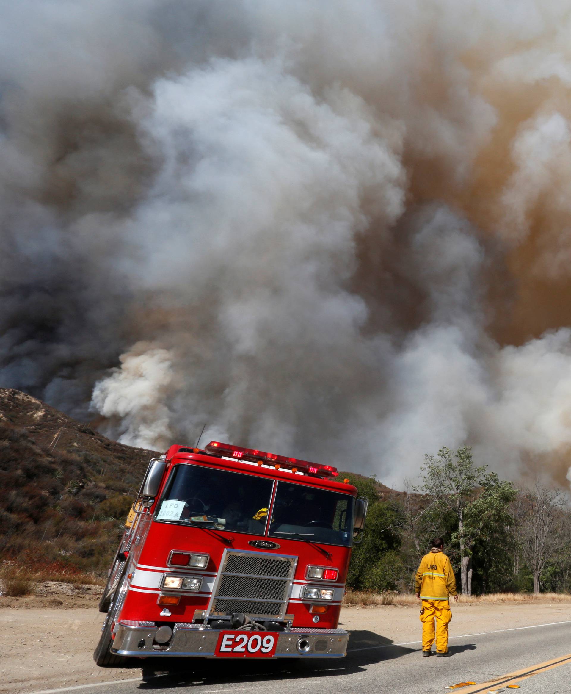 Crews battle the so-called Sand Fire in the Angeles National Forest near Los Angeles, California