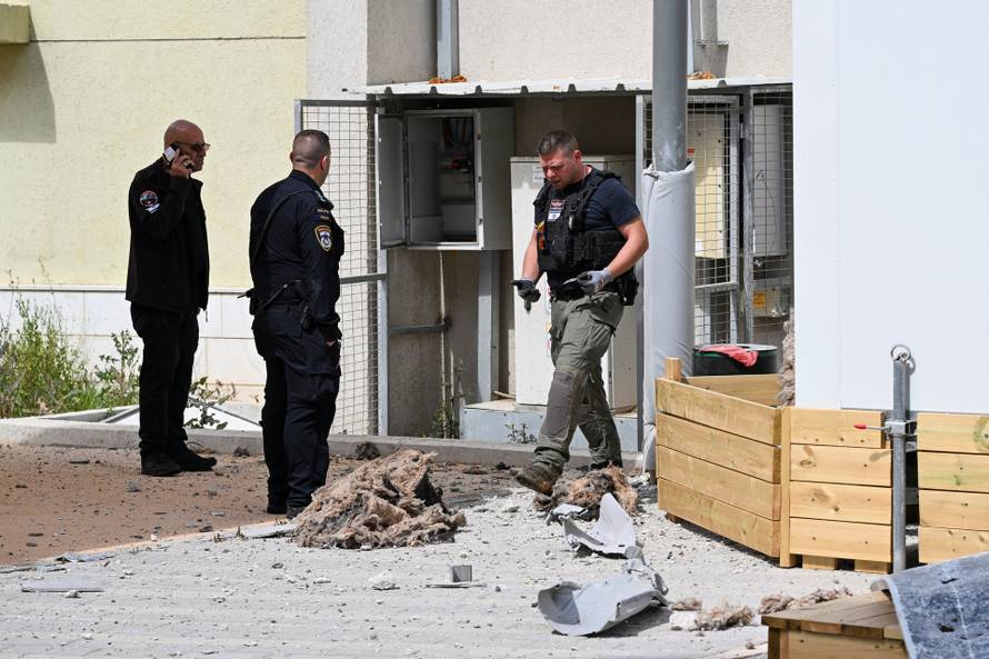 Aftermath of an Iranian missile strike, in Holon