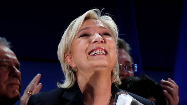 Marine Le Pen, French National Front (FN) political party leader and candidate for French 2017 presidential election, celebrates after early results in the first round of 2017 French presidential election, in Henin-Beaumont