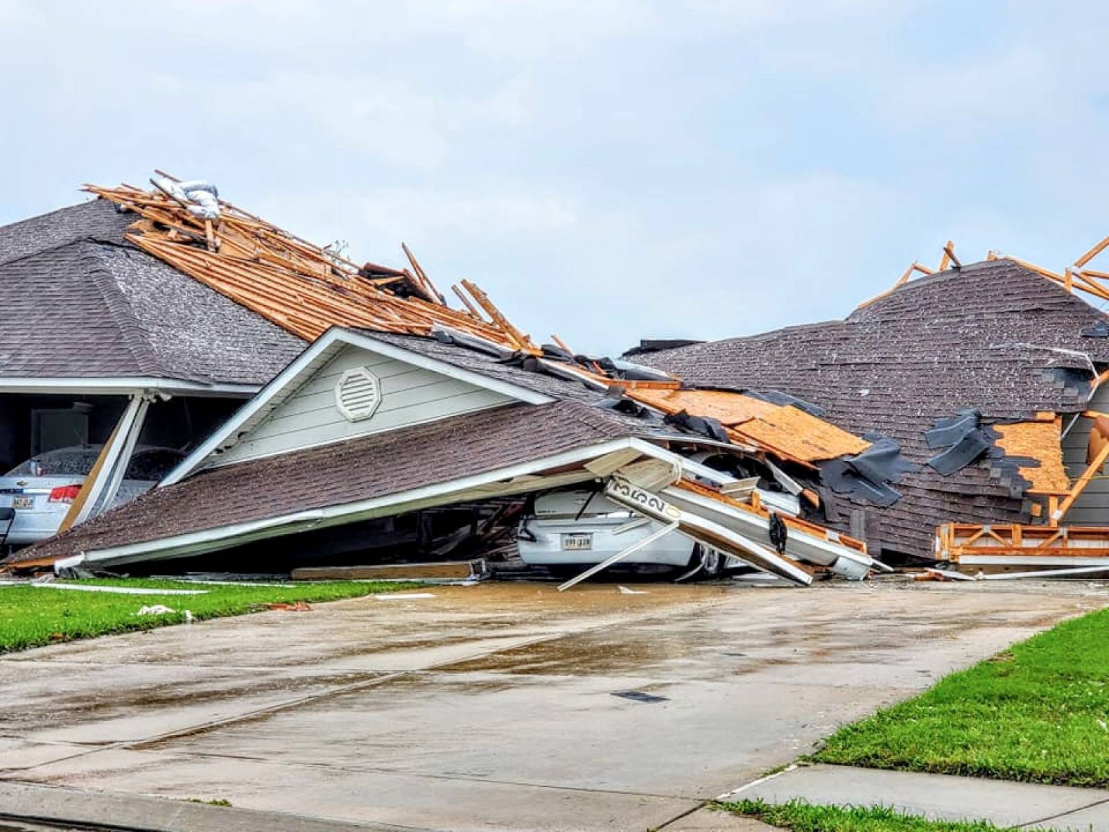 Social media images of damaged buildings and vehicles in the aftermath of a tornado in Monroe, Louisiana