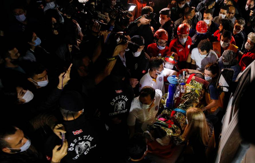 Rescue operations take place on a site after an earthquake struck the Aegean Sea, in the coastal province of Izmir