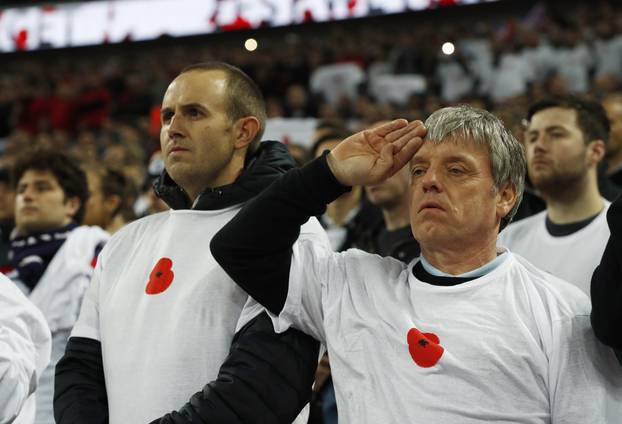 England fans during a minutes silence as part of remembrance commemorations before the match