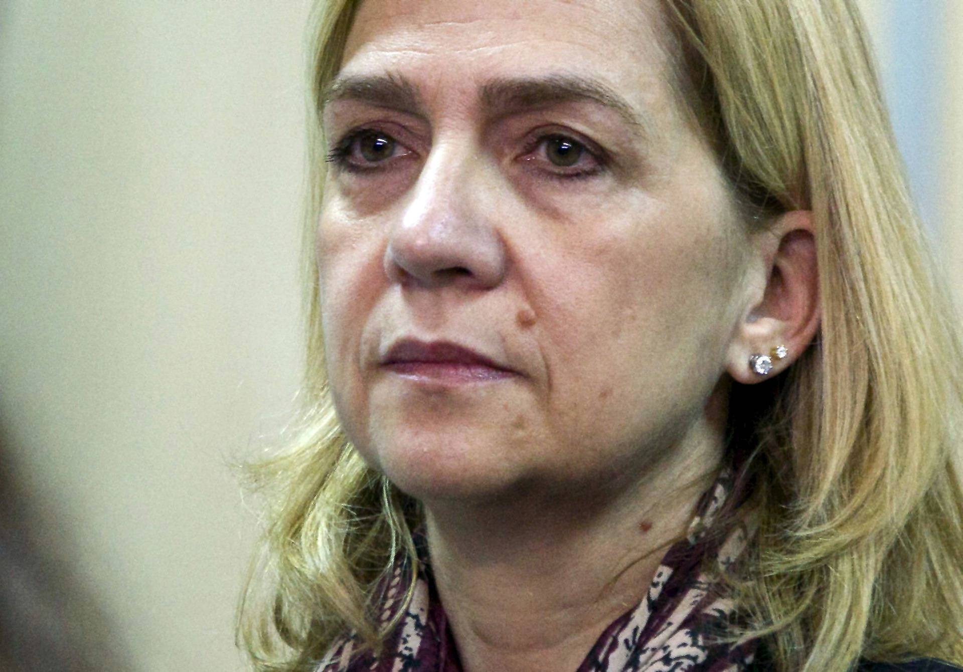FILE PHOTO: Spain's Princess Cristina sits in court facing charges of tax fraud in Palma de Mallorca