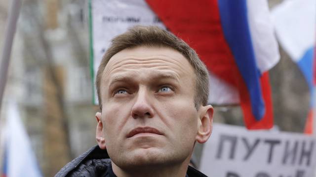 FILE PHOTO: Russian opposition leader Alexei Navalny attends a rally in memory of politician Boris Nemtsov in Moscow