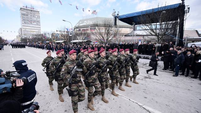 Members of special police forces of Republic of Srpska march during a parade marking the anniversary of Republic of Srpska in Banja Luka