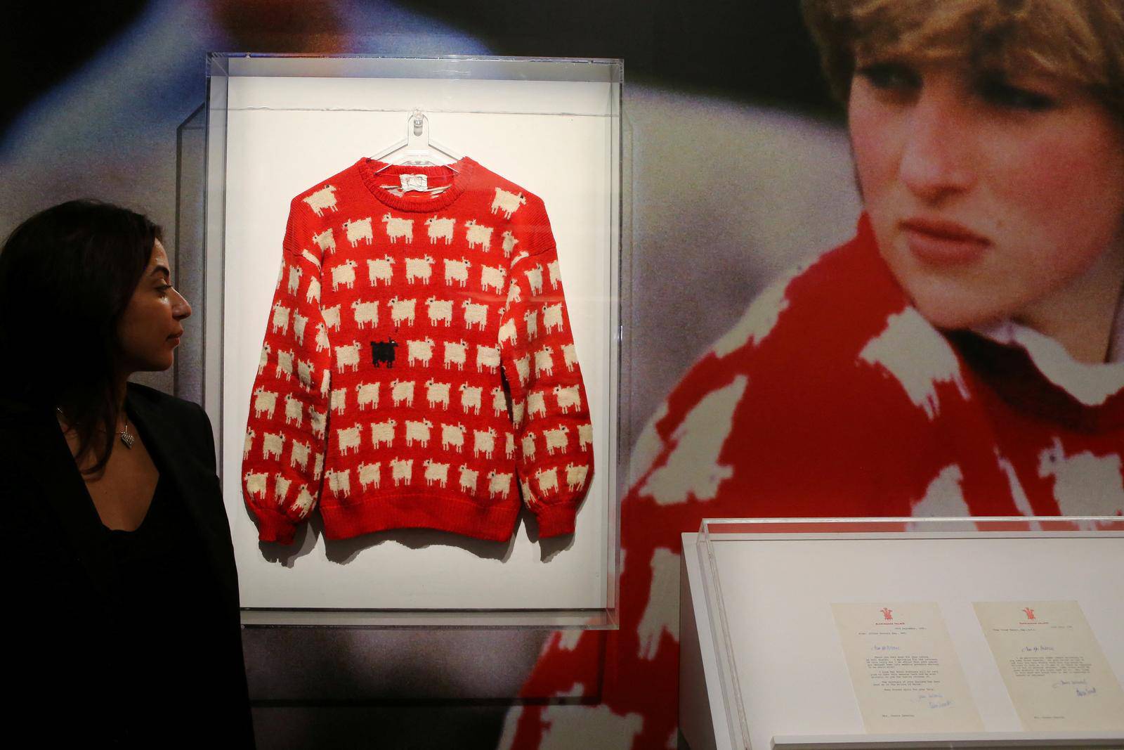 A 'black sheep' jumper worn by Britain's late Diana, Princess of Wales, goes up for auction at Sotheby's, in London