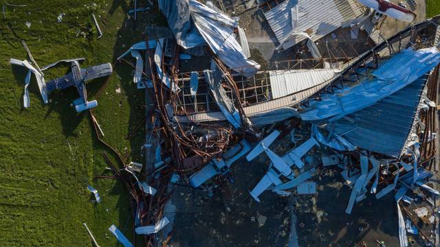 Destroyed planes lie damaged around a hanger in the aftermath of Hurricane Laura in Sulphur, Louisiana,
