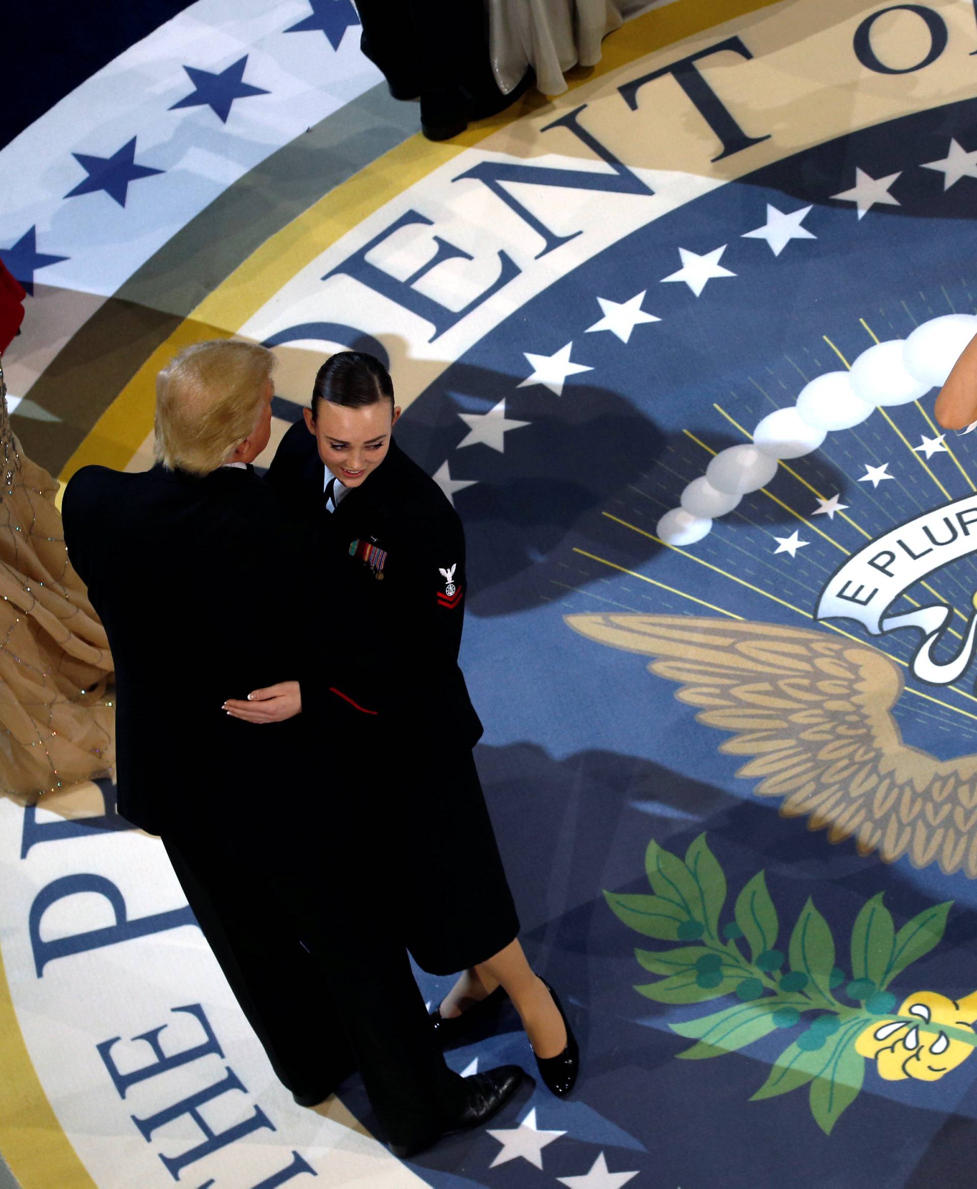 Medina twirls first lady Melania Trump as she and Trump attend the Commander in Chief/Salute to Armed Forces Ball in honor of his inauguration in Washington