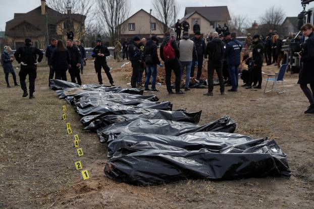 Exhumation of bodies of civilians from a mass grave in Bucha