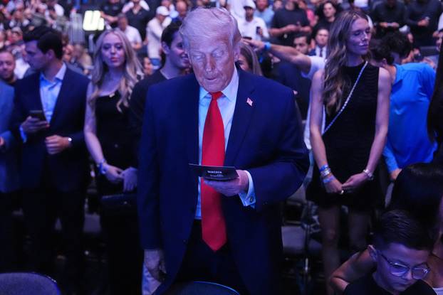 U.S. President Donald Trump attends UFC 327 at Kaseya Center