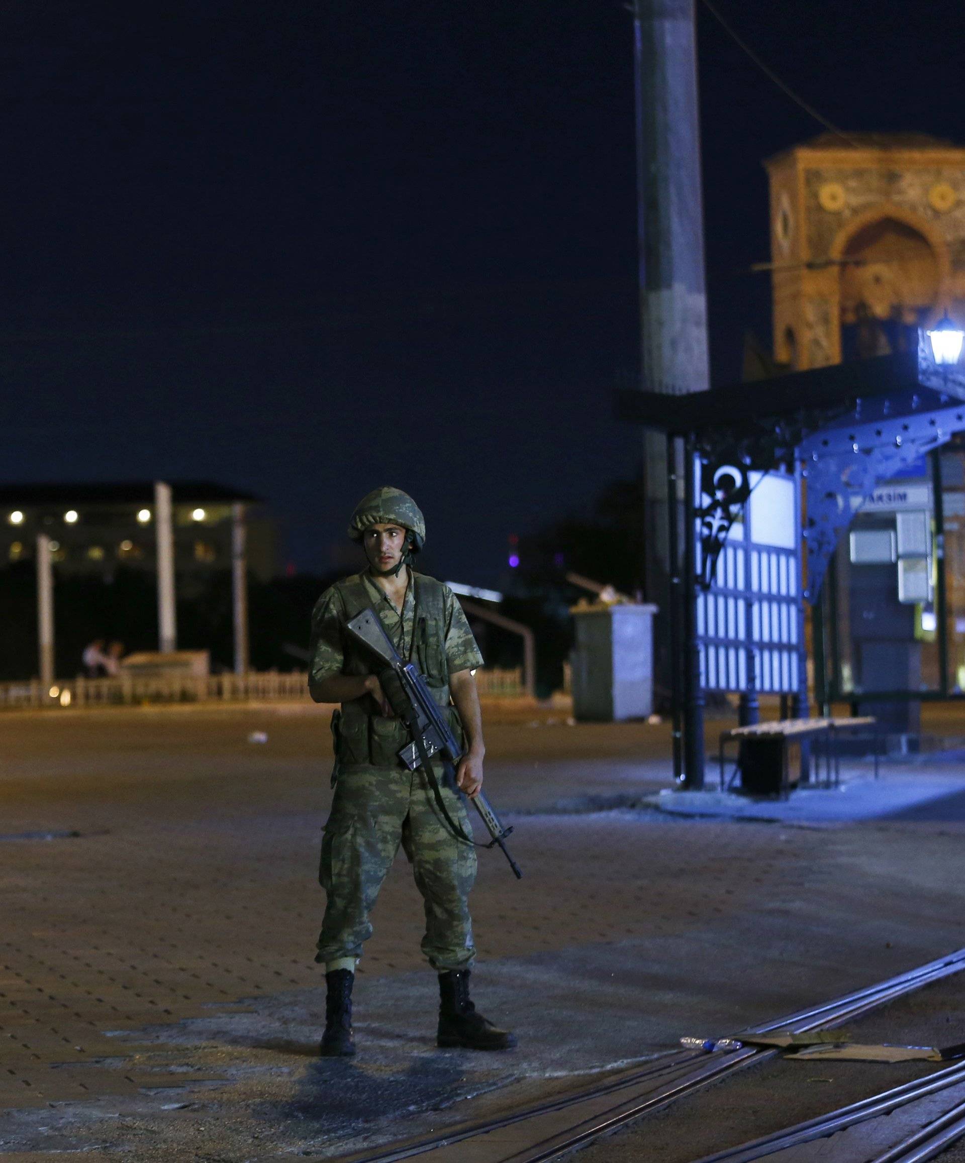 A Turkish military stands guard near the Taksim Square in Istanbul