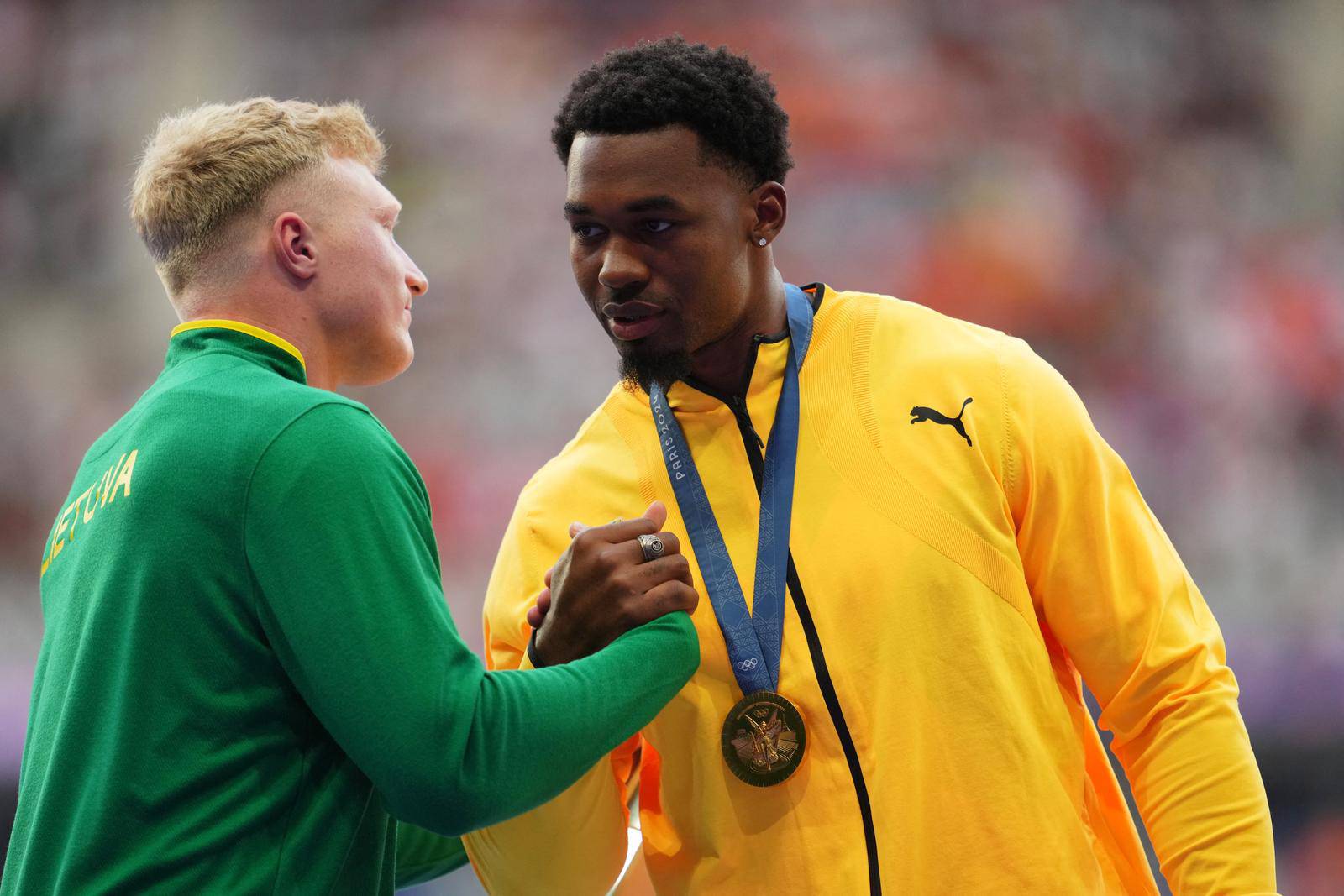 Athletics - Men's Discus Throw Victory Ceremony