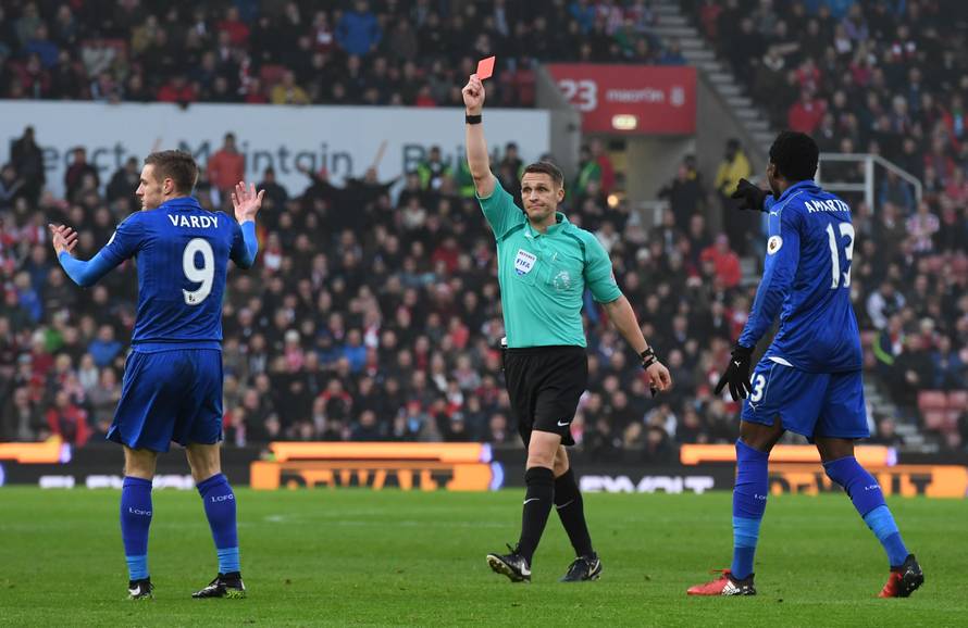 Leicester City's Jamie Vardy is shown a red card by referee Craig Pawson