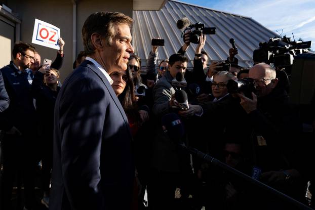 Pennsylvania Republican Senate candidate Dr. Mehmet Oz votes during the midterm election in Montgomery County