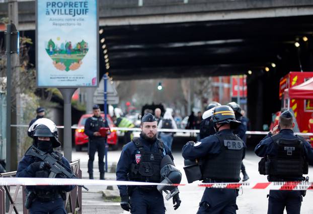 French police secure an area after a knife attack in a public park in Villejuif