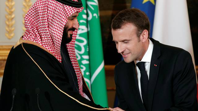 French President Emmanuel Macron and Saudi Arabia's Crown Prince Mohammed bin Salman attend a press conference at the Elysee Palace in Paris