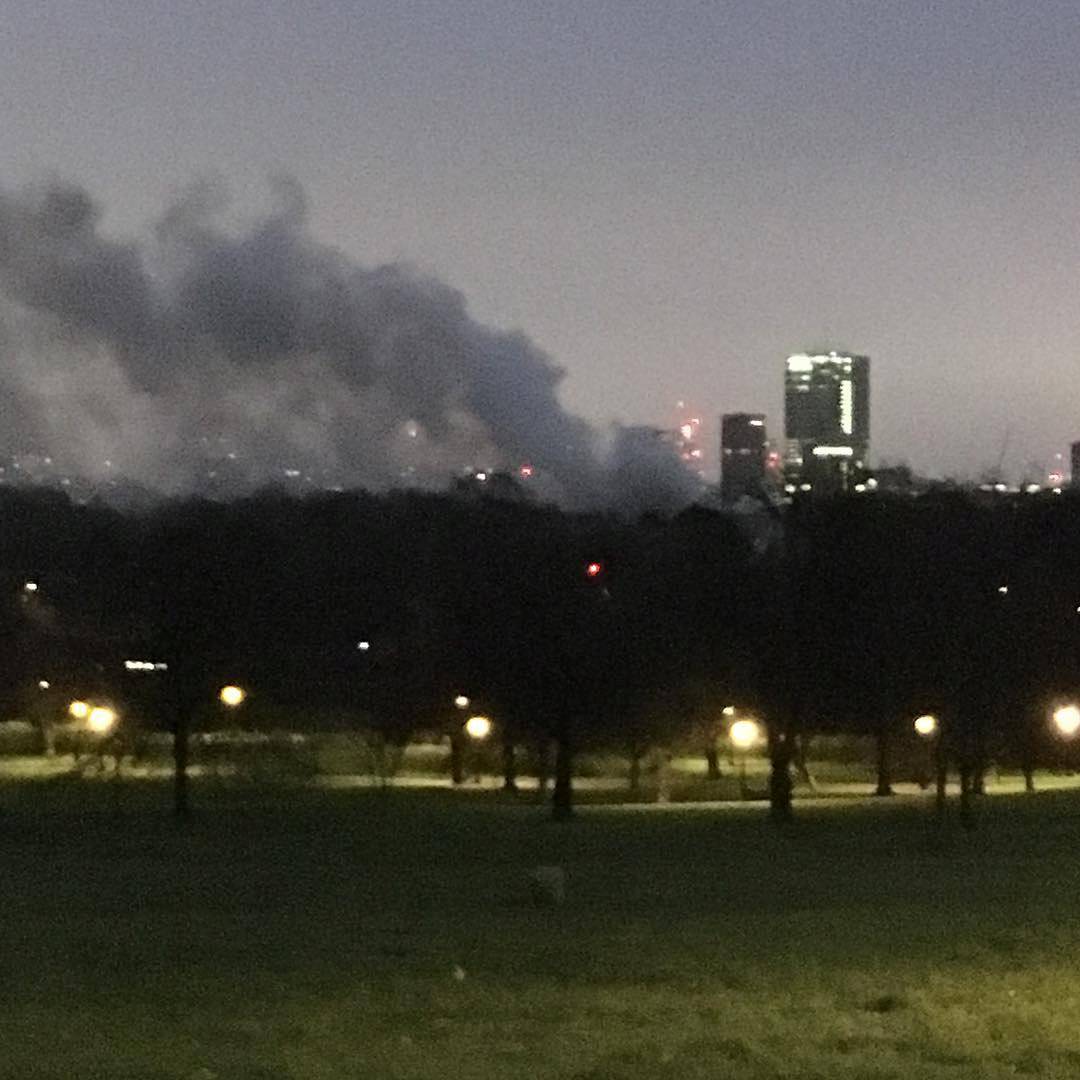 Smoke rises above London Zoo, in London