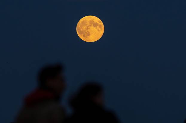 Full moon, known as the Hunter's moon, rises in Berlin