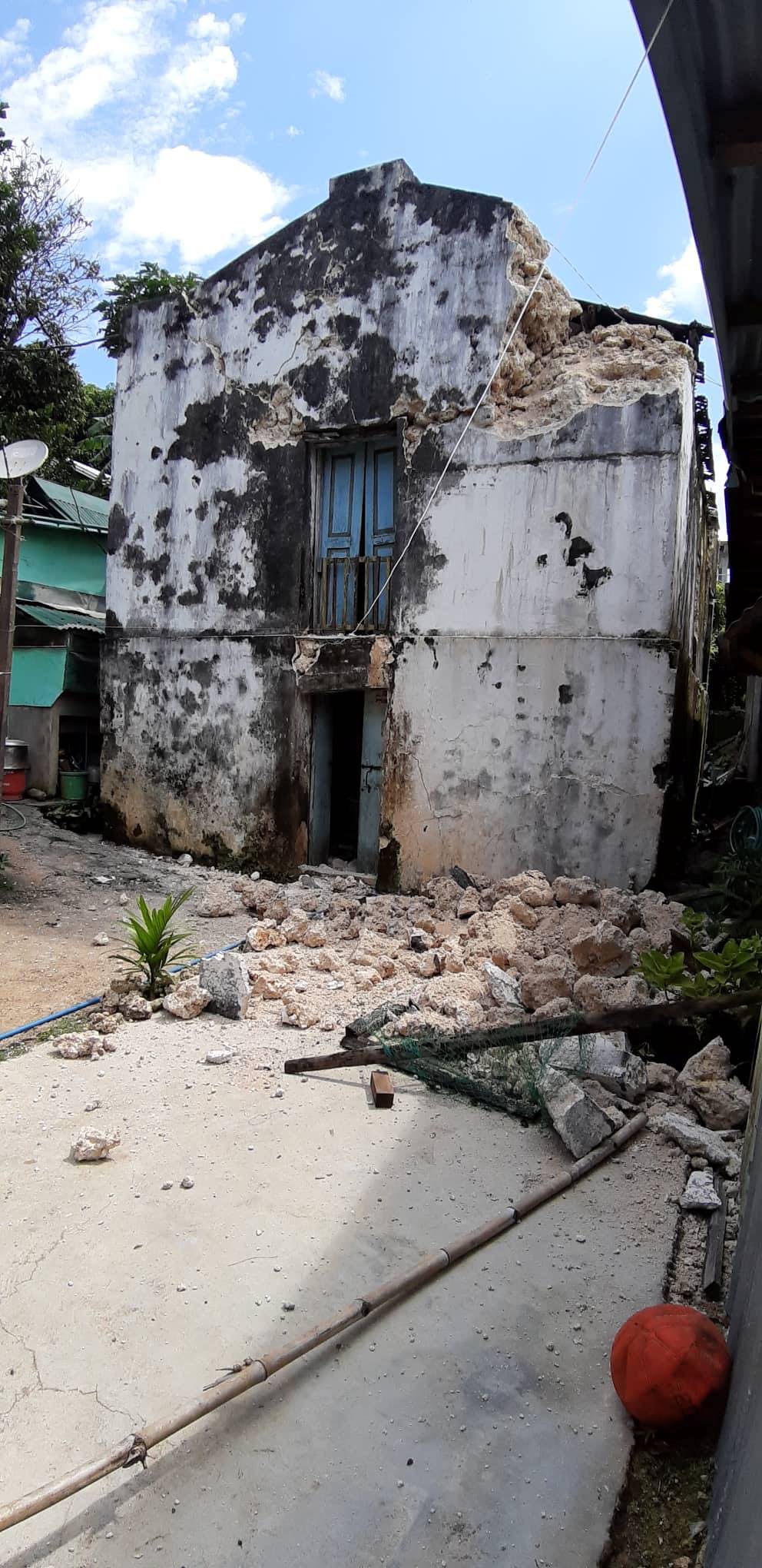 Debris surround a building after an earthquake struck the Batanes Province, in northern Philippines