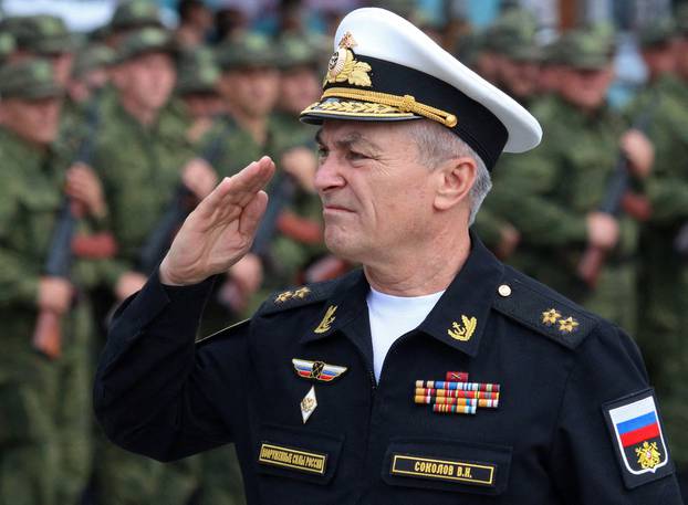 FILE PHOTO: Commander of the Russian Black Sea Fleet Vice-Admiral Viktor Sokolov salutes during a ceremony in Sevastopol