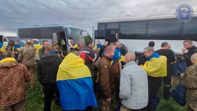 Ukrainian prisoners of war (POW) are seen after a swap at an unknown location in Ukraine