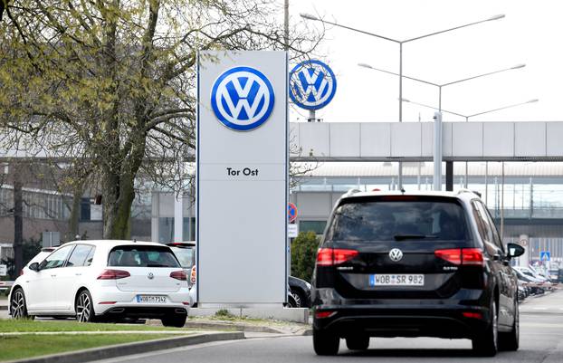Volkswagen logo is seen at their plant in Wolfsburg