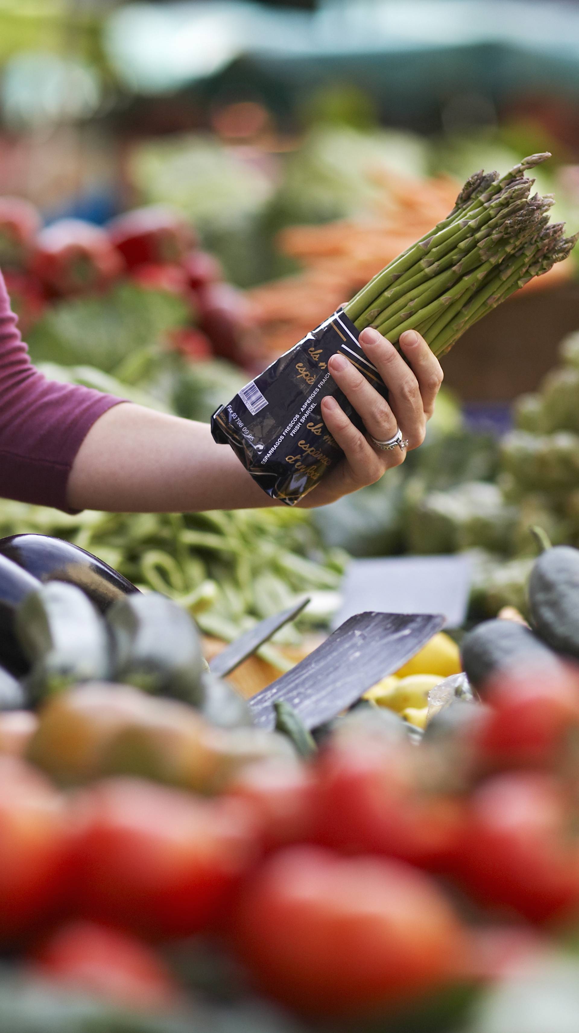 Woman Shopping for Asparagus