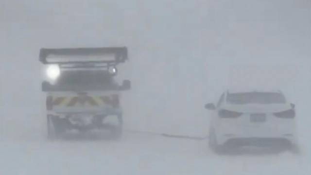Heavy snow blankets highways in California's Nevada County