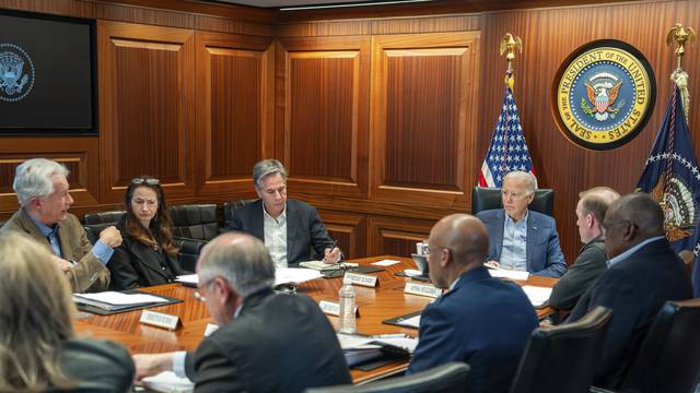 US President Joe Biden meets with members of the National Security Council regarding the unfolding missile attacks on Israel
