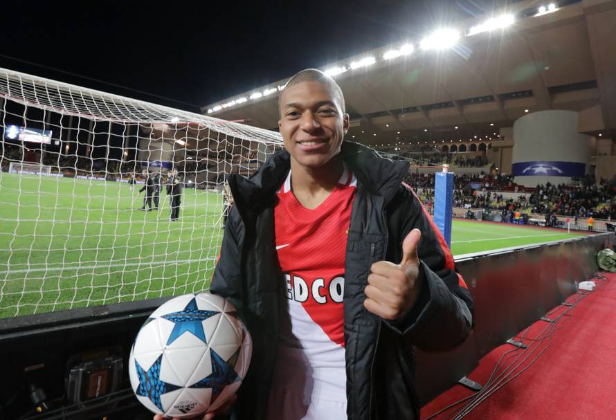 Monaco's Kylian Mbappe-Lottin celebrates after the match
