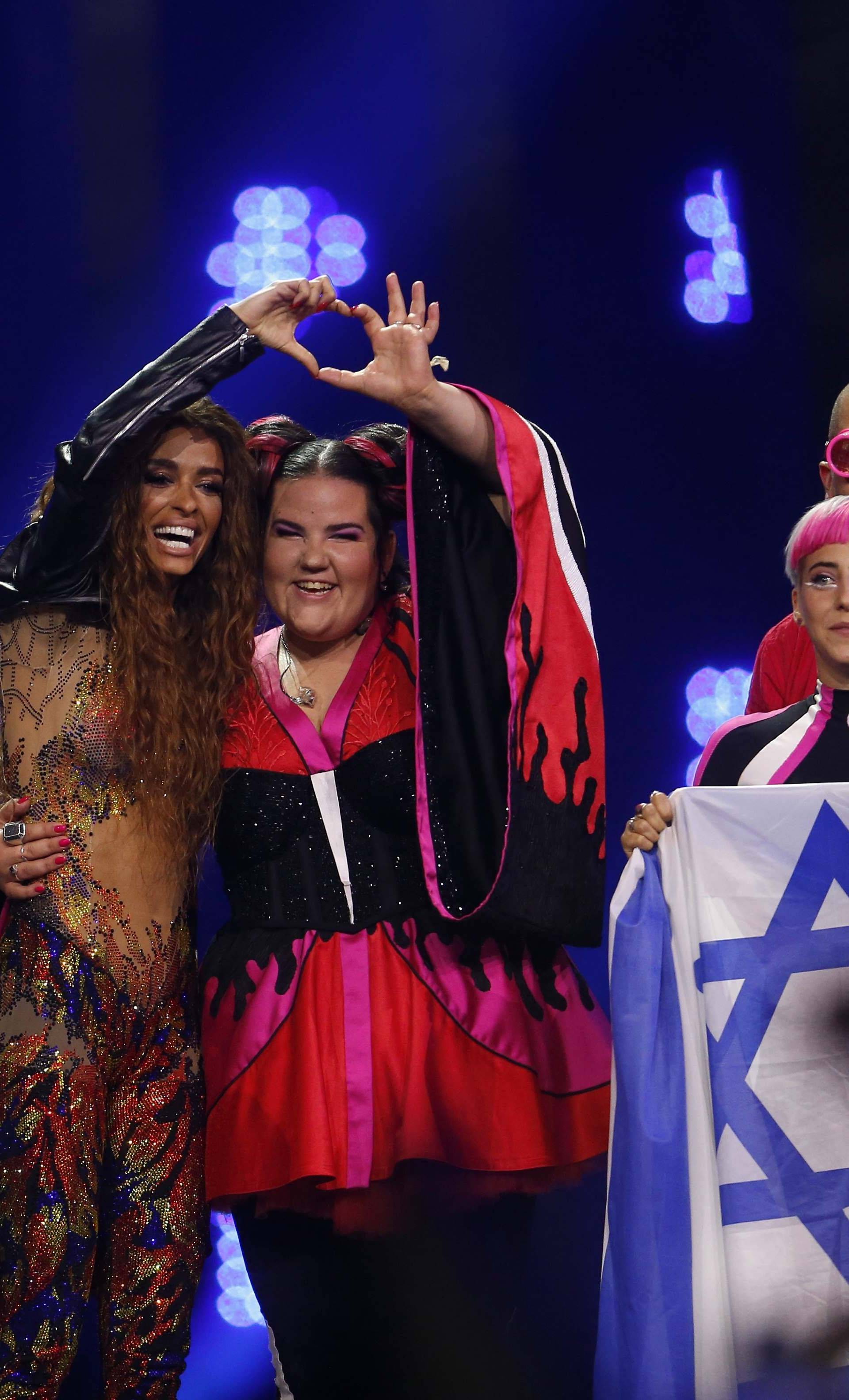 Cyprusâs Eleni Foureira and Israelâs Netta react after the Semi-Final 1 for Eurovision Song Contest 2018 in Lisbon