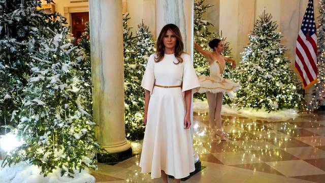 Trump tours the holiday decorations with reporters at the White House in Washington