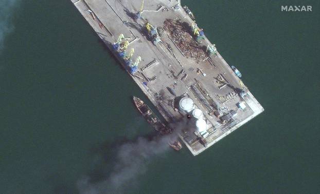 A satellite image shows a closer view of a capsized Alligator-class landing ship, at the port of Berdiansk