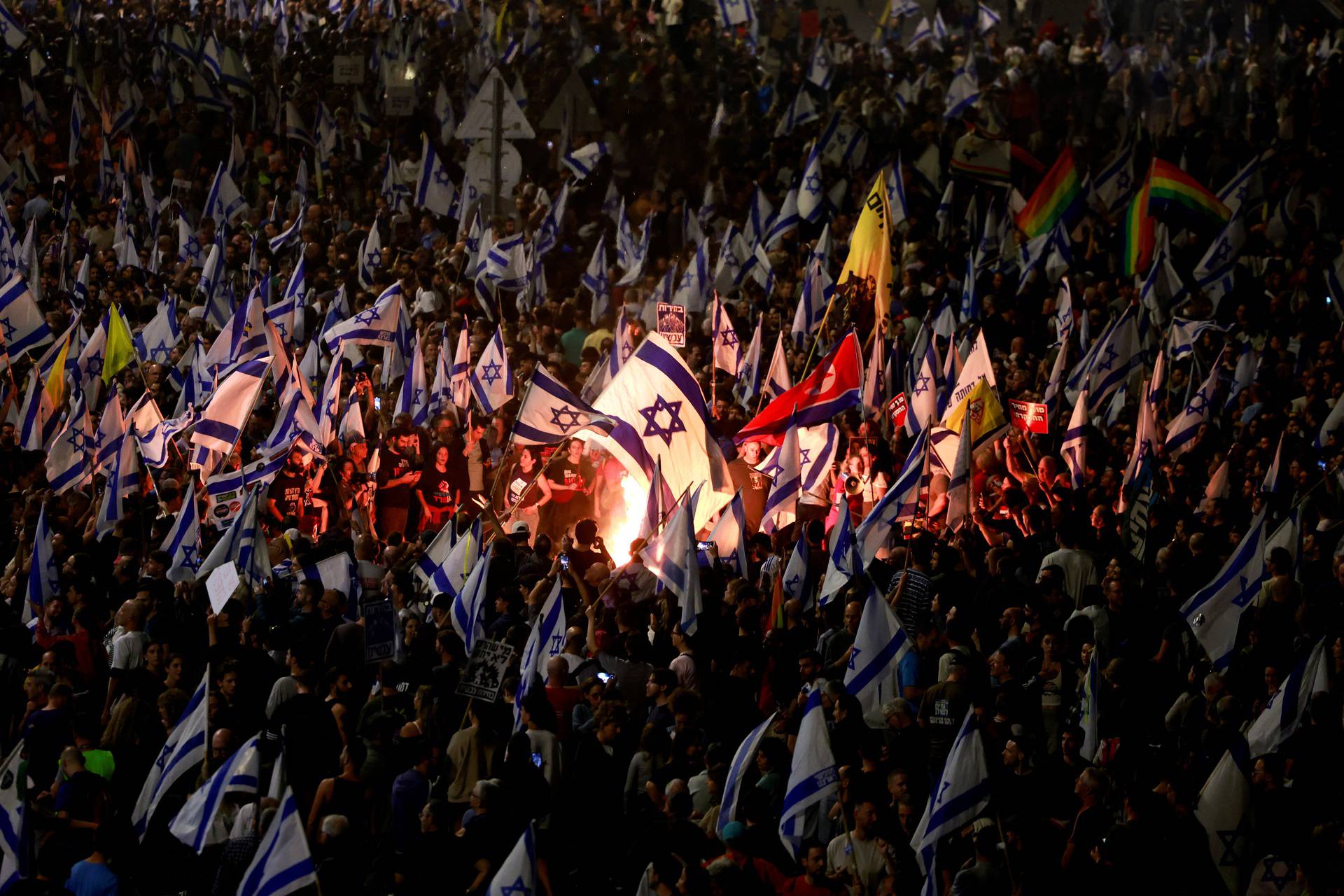 Israelis demonstrate after Israeli Prime Minister Benjamin Netanyahu sacked his defense minister, Yoav Gallant, citing lack of trust, in Tel Aviv