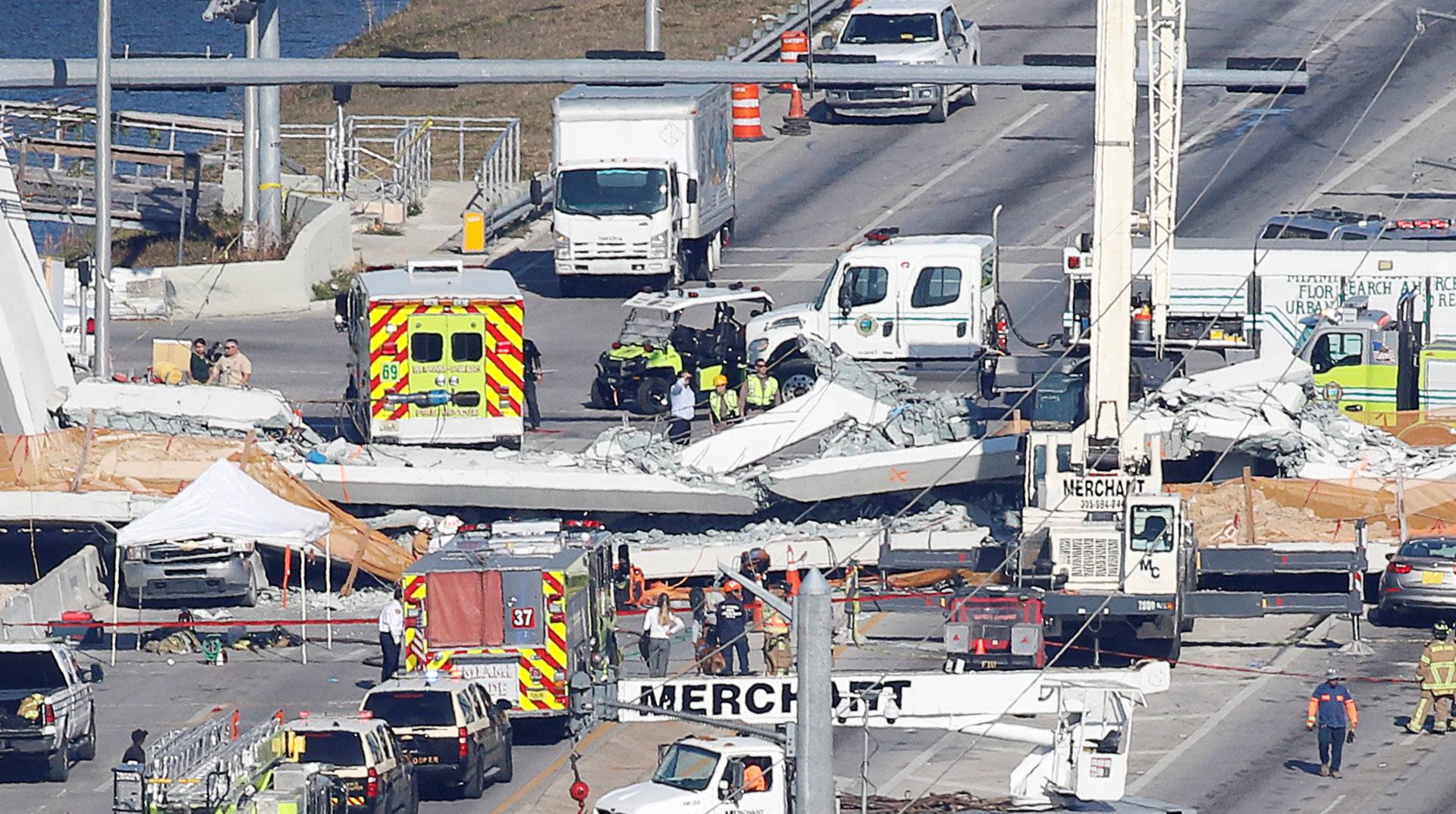 Aerial view shows a pedestrian bridge collapsed at Florida International University in Miami