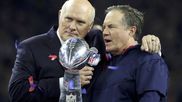 New England Patriots' head coach Belichick is interviewed by broadcaster Bradshaw next to the Vince Lombardi trophy after the Patriots defeated the Atlanta Falcons to win Super Bowl LI in Houston