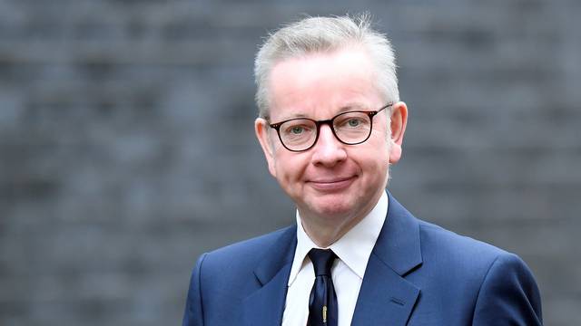 FILE PHOTO: Michael Gove arrives at Downing Street in London